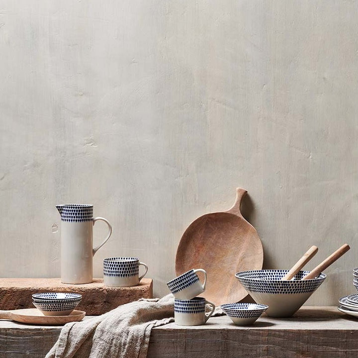 Indigo ceramic Drop Jug by Nkuku featuring a sleek, rounded design and glossy finish, perfect for serving or decorative use.