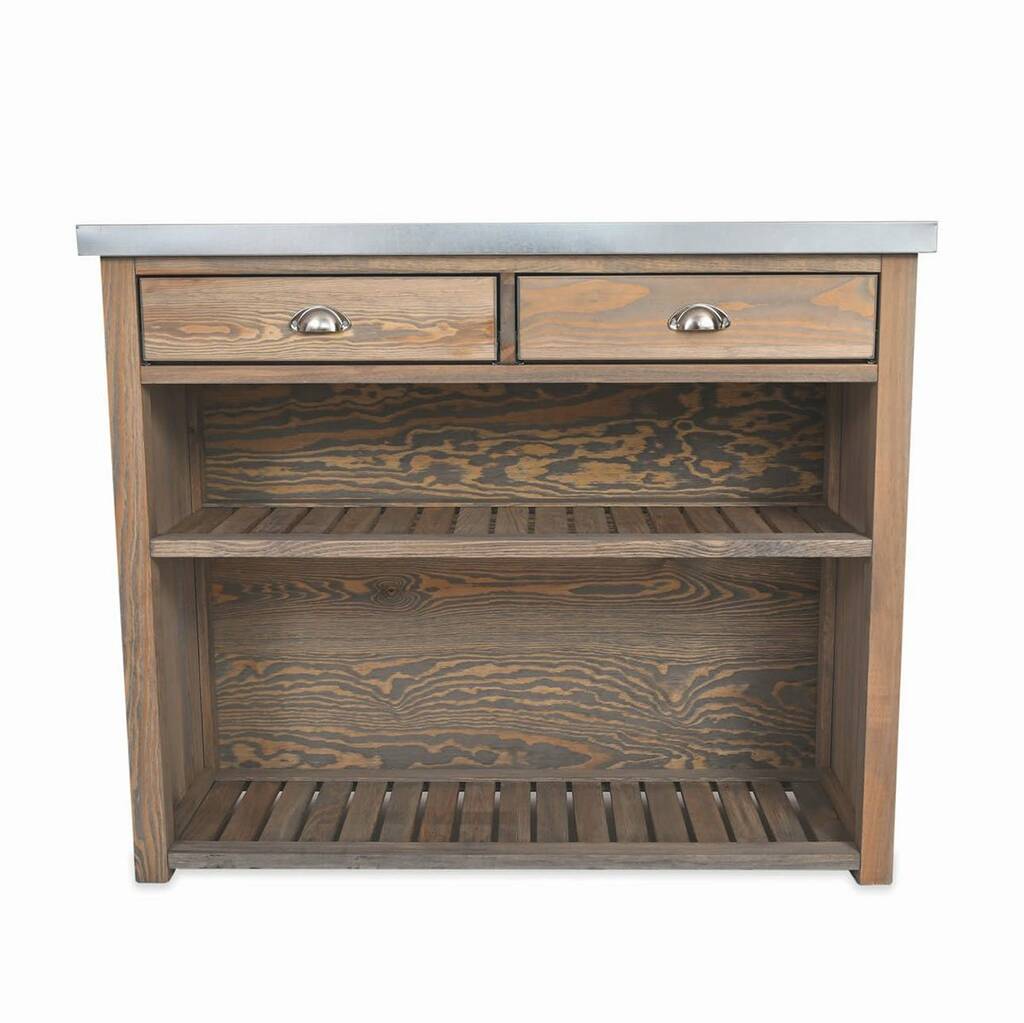 A wooden Aldsworth Bootroom Unit by Garden Trading with storage shelves and hooks for boots and outdoor shoes.