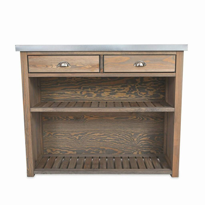 A wooden Aldsworth Bootroom Unit by Garden Trading with storage shelves and hooks for boots and outdoor shoes.