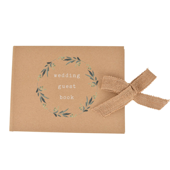 Wedding guest book by Widdop &amp; Co, Cornucopia Home and Gift, featuring elegant cover and space for guests to sign and leave messages.